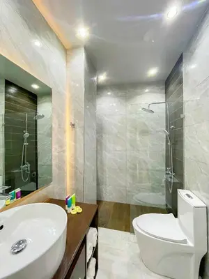 a bathroom with a toilet and a sink and a shower at spectacular sea view in Santo Domingo