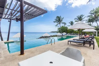 a swimming pool with a view of the ocean at 