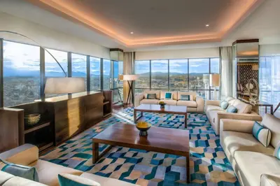 a living room with couches and a table at JW Marriott Hotel Santo Domingo in Santo Domingo
