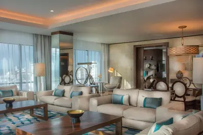 a large living room with couches and a table at JW Marriott Hotel Santo Domingo in Santo Domingo