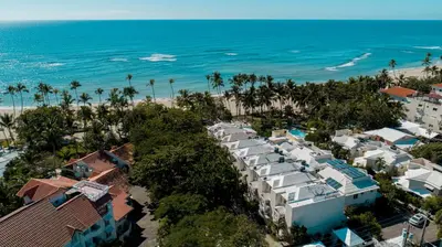 an aerial view of a resort and the beach at Amazing apartment, B-Juan Dolio, El Bonio II in Juan Dolio