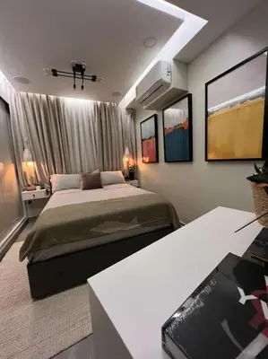 a bedroom with a large bed in a room at Lux Ph & Rooftop Terrace to Relax in Santiago de los Caballeros