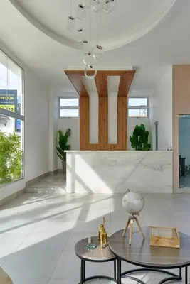 a living room with a table in the middle at Central Suites Tower in Santo Domingo