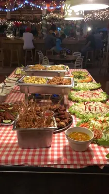 a buffet table with many different types of food at Hotel Voramar in Sosúa