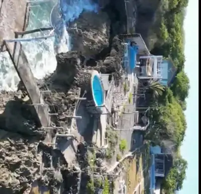 an aerial view of a mountain with houses on it at Villas El Bucanero in San Felipe de Puerto Plata