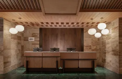 an office with a reception desk and lights at Santo Domingo Marriott Hotel Piantini in Santo Domingo