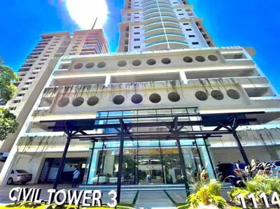 a large white building with two tall buildings at VIP DELUXE AND TOWER J7_POOL_GYM_SAUNE_WIFE in Santo Domingo
