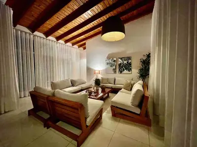 a living room with couches and a table at LUXURY_VIP_Villa_LifeStyle puerto plata in San Felipe de Puerto Plata