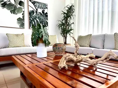 a living room with a wooden coffee table and a couch at LUXURY_VIP_Villa_LifeStyle puerto plata in San Felipe de Puerto Plata