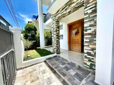a front door of a house with a porch at LUXURY_VIP_Villa_LifeStyle puerto plata in San Felipe de Puerto Plata