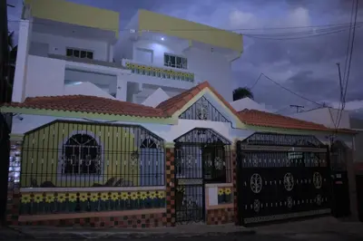 a house with a gate in front of it at R.G sol 2 in Pantoja