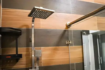 a shower in a bathroom with a glass door at Apart hotel Costa Verde Exclusivo y Seguro #5 con cama Queen in Las Galeras