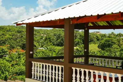 a view from the balcony of a house with a white roof at Apart hotel Costa Verde Exclusivo y Seguro #5 con cama Queen in Las Galeras