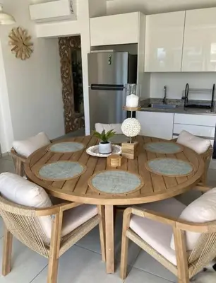 a wooden table and chairs in a kitchen at Luxury Apartment Dominicus in La Laguna