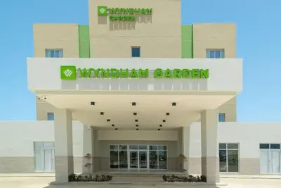 a rendering of the front of a wydenham garden building at Wyndham Garden El Morro Montecristi in El Rincón