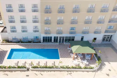 an overhead view of a hotel with a swimming pool at Wyndham Garden El Morro Montecristi in El Rincón