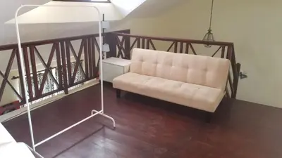 a white couch sitting in a living room at Condo Penthouse Batey Dominicus in Bayahibe
