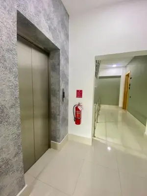 a hallway with a door and a fire hydrant at Cozy City Center Condo Full AC in Santo Domingo