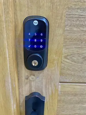 a close up of a door with a sony phone on it at Cozy City Center Condo Full AC in Santo Domingo