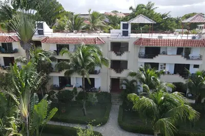 an aerial view of a resort with palm trees at Caribe Campo Sosua in Sosúa