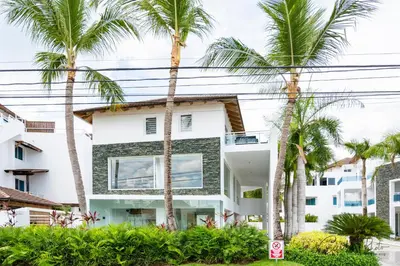 a house with palm trees in front of it at Paradise Dream Dominicus in La Laguna