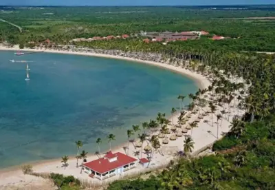 an aerial view of a beach with a resort at Confortable apartamento en Playa Nueva Romana in San Pedro de Macorís
