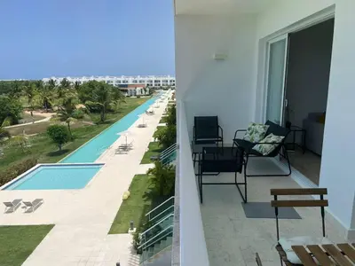 a view of a swimming pool from a building at Hard Rock at Cana Rock 3 by Unwind Properties in Punta Cana