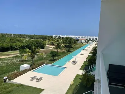 an overhead view of a swimming pool at a resort at Hard Rock at Cana Rock 3 by Unwind Properties in Punta Cana
