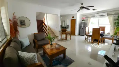 a living room with a couch and a table at Rooftop with Pool, La Romana, Villa Doña Julia, At Paula Isabel in La Romana