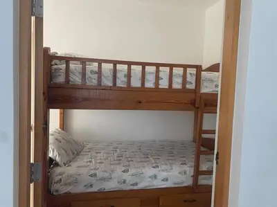 a couple of bunk beds in a room at Heavenly View in San Felipe de Puerto Plata