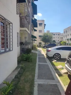 a street with a car parked next to a building at Apartamento acogedor J-A in Los Paredones