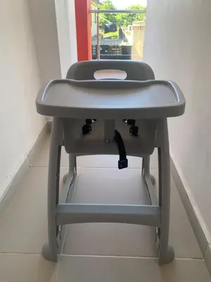 a gray bench in a room with a window at Plataview Apartahotel apt 4A in Monte Plata