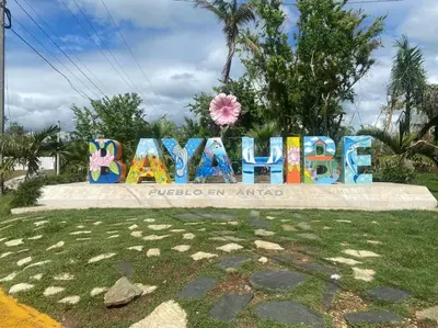 a sign that says ayoria in antigua at Portitxol, fantástico apartamento in Bayahibe