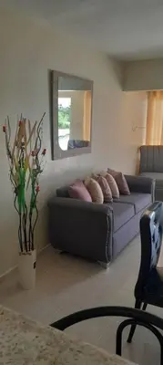 a living room with a couch and a window at SDQ Apartamento Marbella 2 in La Ureña