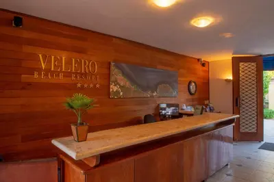 a bar with a sign that reads welcome black ranger at Velero Beach Resort in Cabarete