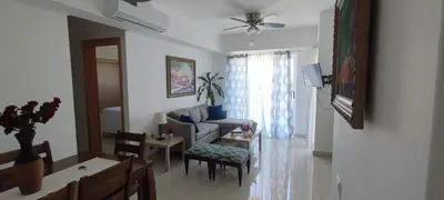a living room with a couch and a table at Boca del Mar Residence, Boca Chica in Boca Chica