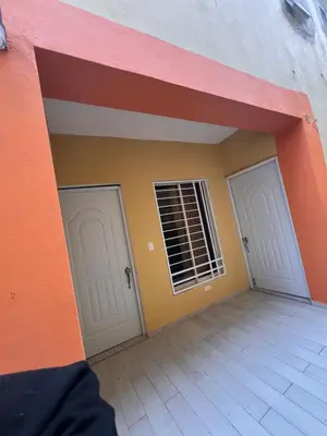 a room with two doors and a wall at Apartamento la familia 2 in Santa Bárbara de Samaná