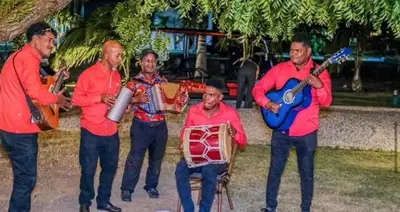 a group of men playing music and playing instruments at Playa Palmera Ocean View in Punta Cana