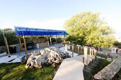 a sculpture of a sheep in a park at Hotel Don Bululo Camping Lodge in Punta Rucia