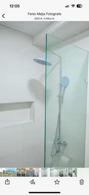 a shower with a glass door in a bathroom at Suite in San Pedro De Macoris in San Pedro de Macorís
