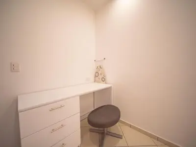 a room with a desk and a chair at 2BR Luxury Apartment in Heart Of Nightlife Area in Sosúa