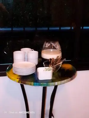 a table topped with plates and bowls on top at Hotelito Bonito Eli & Edw in Santo Domingo