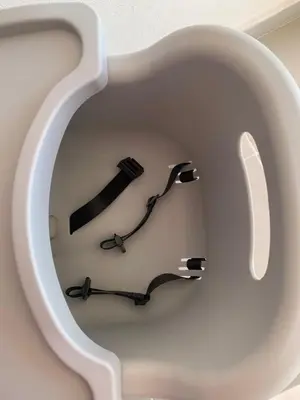 a pair of glasses sitting in a white holder at Plataview Apartahotel apt 3A in Monte Plata
