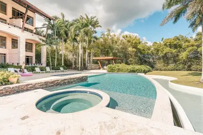 a swimming pool in the middle of a yard at Wonderful 1-BR apartment at Casa de Campo in El Infiernito