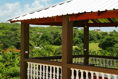 a view from the deck of a house with a white roof at Apart Hotel Costa Verde - #2 Exclusivo y Seguro cama King zise in Las Galeras