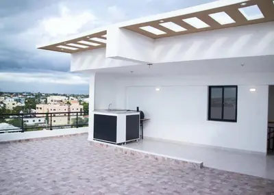 a white building with a television on a balcony at Torre Sophia Monserrat in Los Frailes