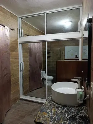 a bathroom with a shower and a tub and a toilet at Apart hotel Costa Verde #3 Exclusivo y Seguro in Santa Bárbara de Samaná