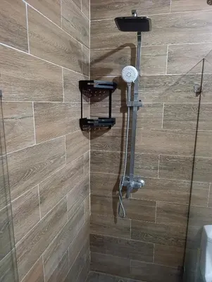 a shower with a shower head in a bathroom at Apart hotel Costa Verde #3 Exclusivo y Seguro in Santa Bárbara de Samaná