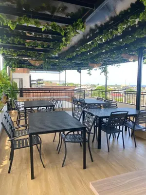 a group of tables and chairs on a patio at RIG Colonial Experience in Santo Domingo