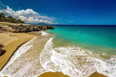 an aerial view of a beach with the ocean at Acogedor Apartamento remodelado in Sosúa